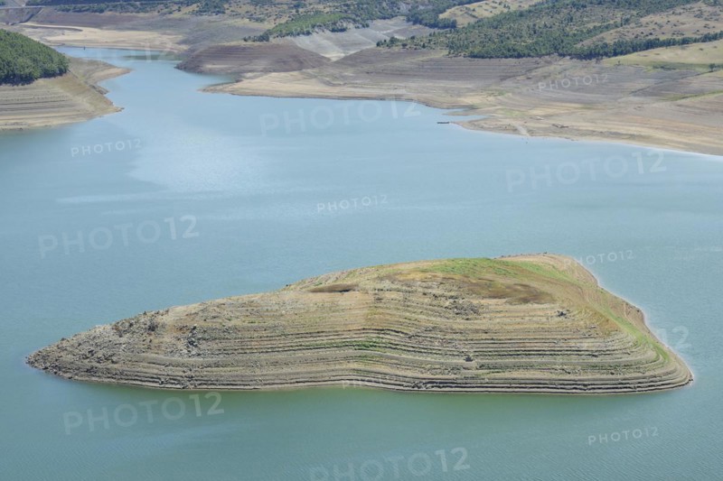Little water in the Fierza reservoir with dry shore