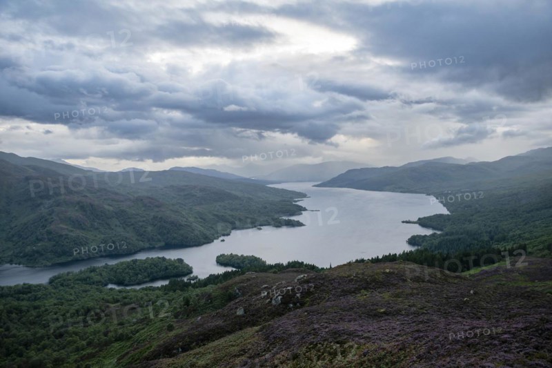 View over Loch Katrine from Ben Aan under cloudy skies