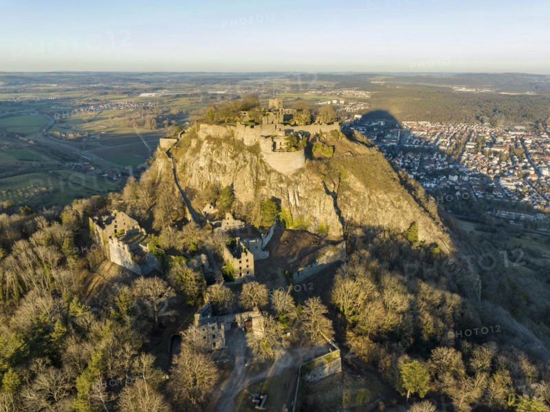 The volcanic cone Hohentwiel with the castle ruins illuminated by the evening sun
