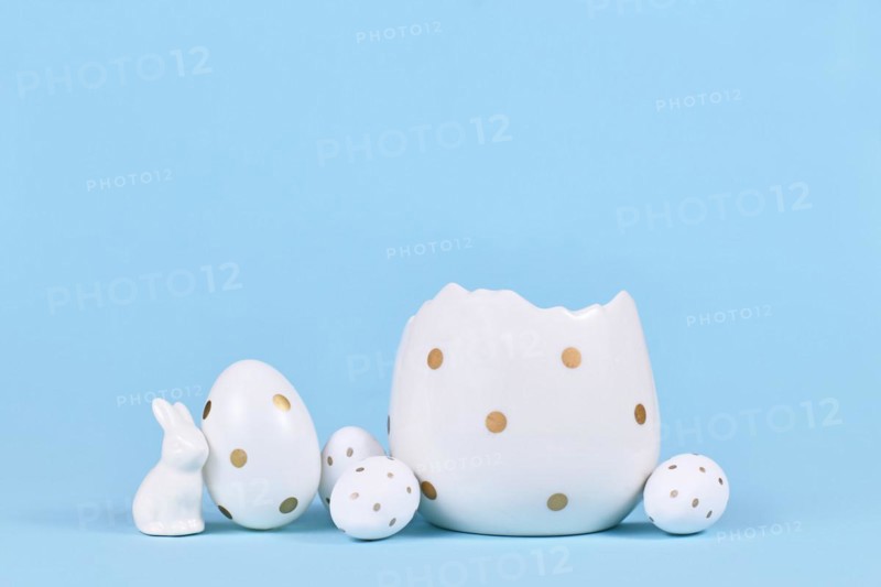 White easter eggs with golden dots