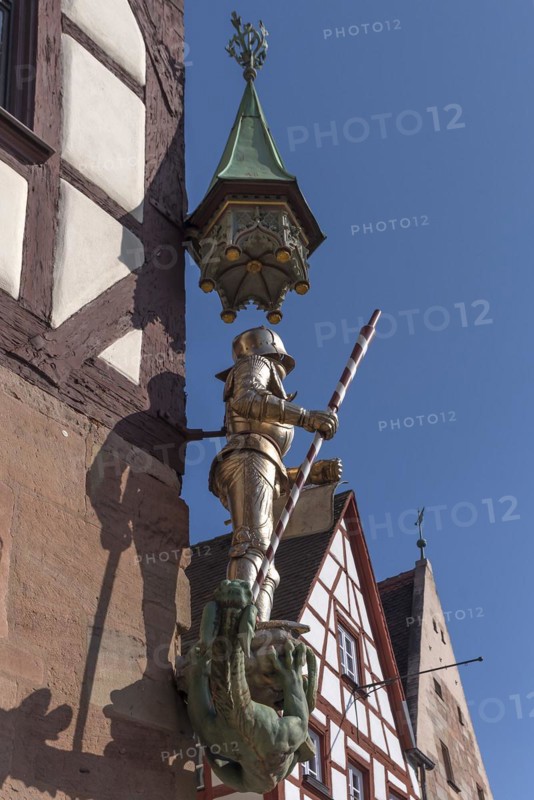 Figure of St. George as dragon slayer on Pilatus House