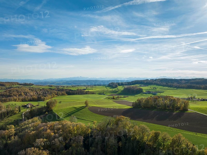 Hilly landscape and scattered settlement in the foothills of the Alps near Klingenzell