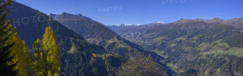 Snow-covered mountains above the Ulten Valley behind Zufrittspitze Tuferspitze and Hasenoehrl seen from the Pfrollnhof wine tavern