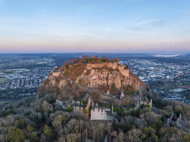 The volcanic cone Hohentwiel with the castle ruins illuminated by the evening sun