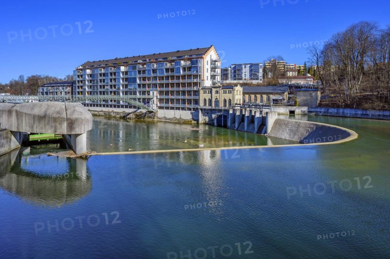 Old renovated spinning mill and weir
