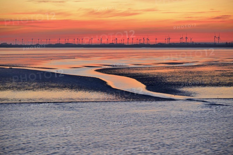 View over the Wadden Sea at low tide to the mainland