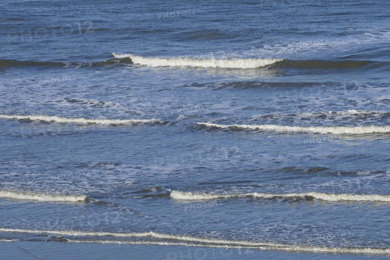Leaking waves on a sandy beach