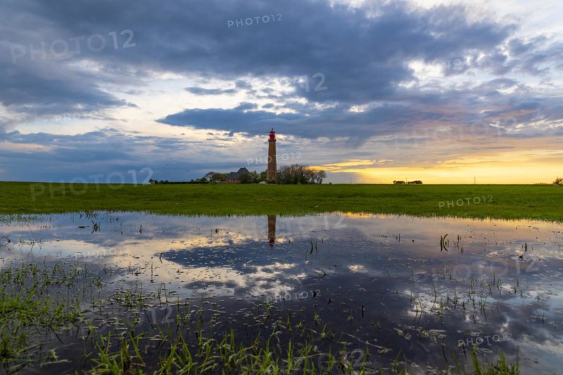 Sunset reflection at Fluegge lighthouse