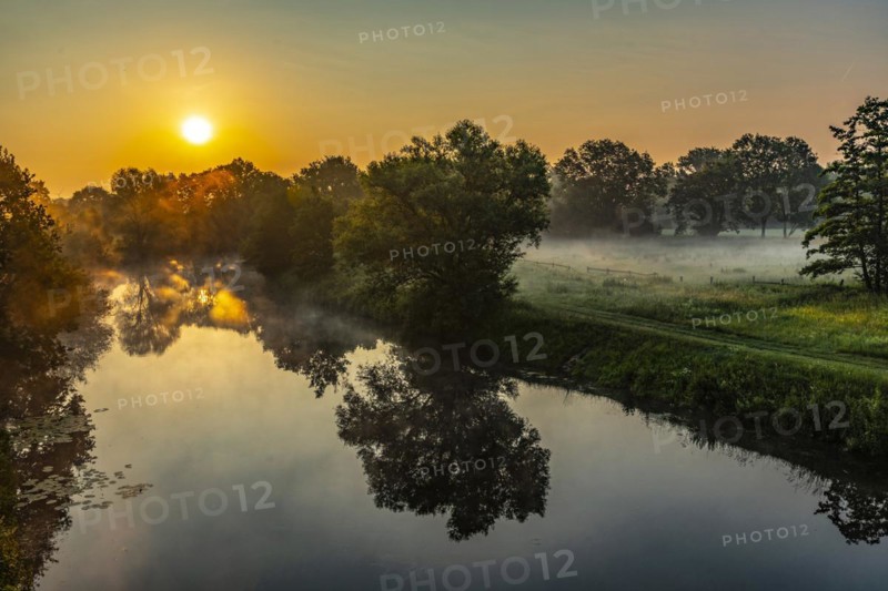 Sunrise and morning fog over the Ems near Telgte