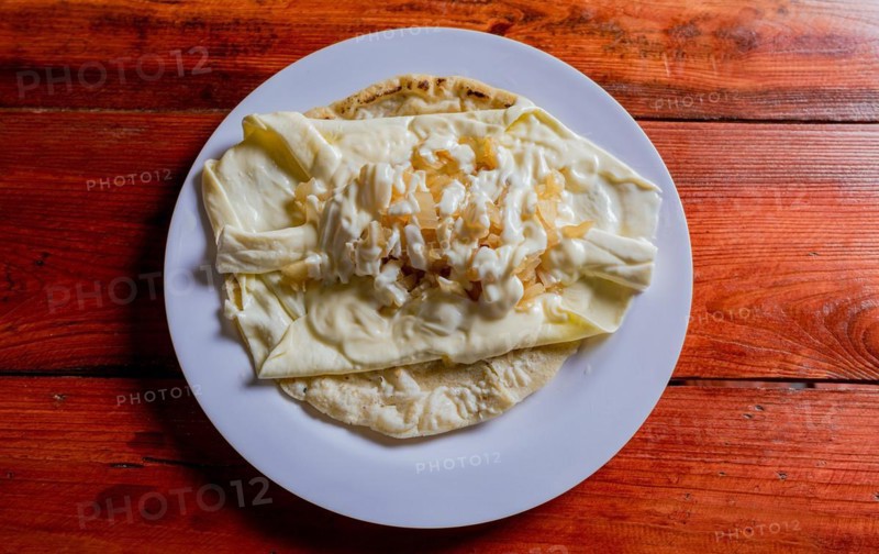 Top View of traditional Cheese with Pickled Onion