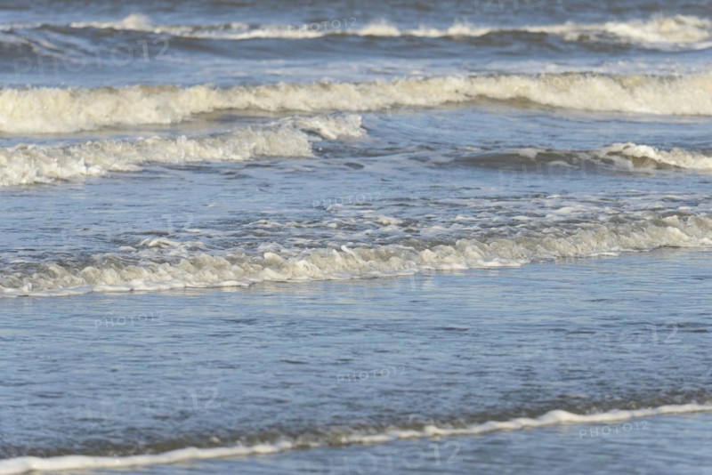 Leaking waves on a sandy beach