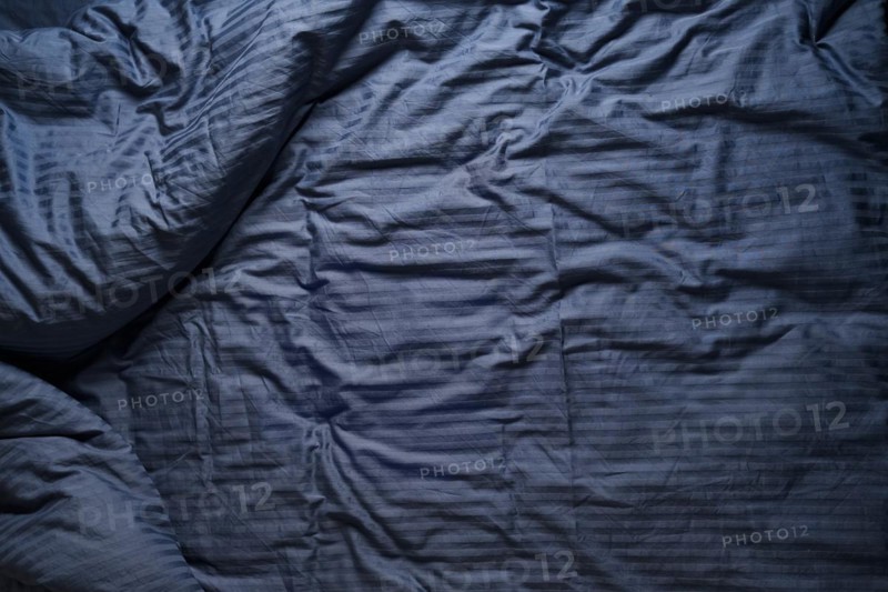 Top view of the crumpled bed linen
