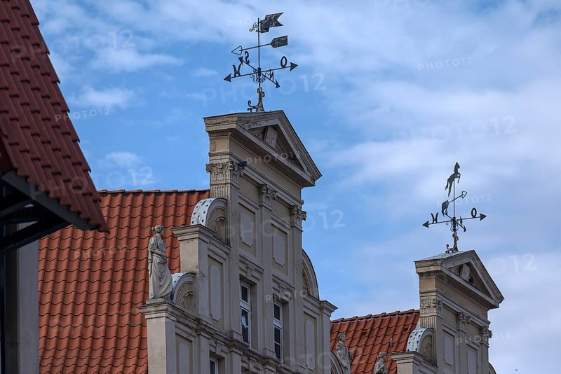 Antique wind direction indicators on historic gables