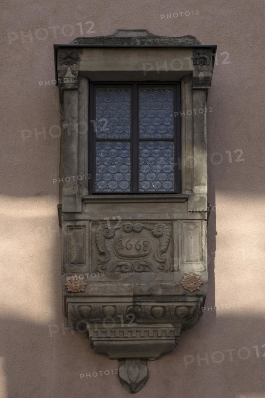 Historic sandstone oriel from 1668