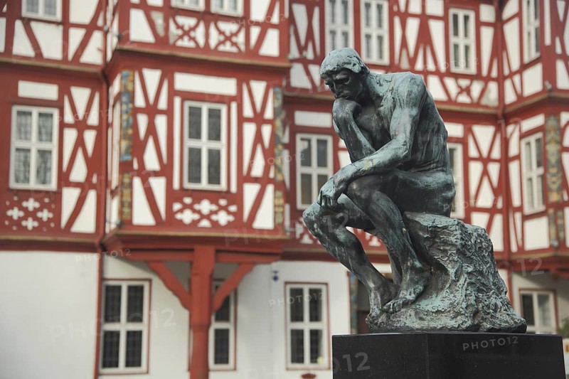Sculpture The Thinker by Auguste Rodin 1880 in front of the Adelsheimer Hof