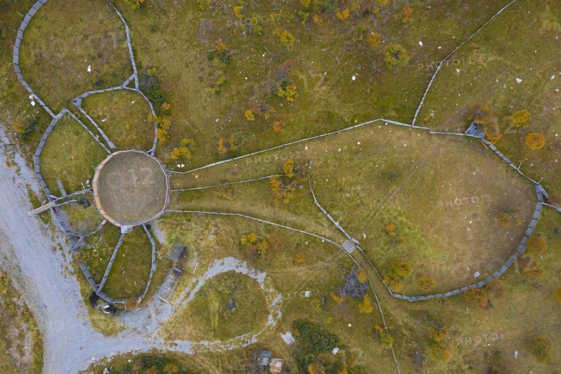 Aerial view over fences of Sami herders corral for trapping reindeer in autumn at Haerjedalen