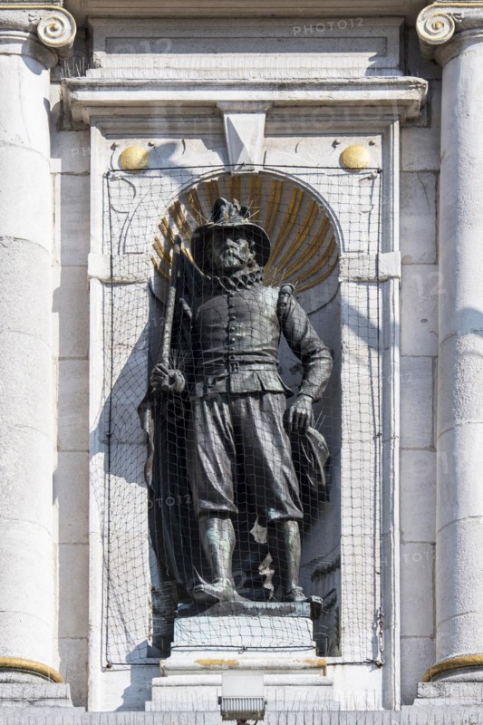 Statue protected with anti-bird net and anti roosting spikes against city pigeons at the Nederlands Toneel Gent