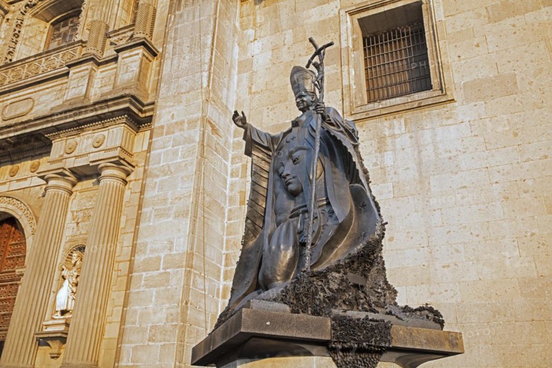 The statue of the pope with the virgin of Guadalupe in his mantel