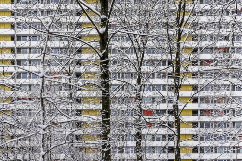 Asemwald residential complex in winter. In front of the facade