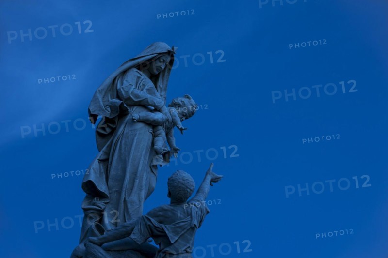 The statue Notre-Dame des naufrages at the Pointe du Raz at night