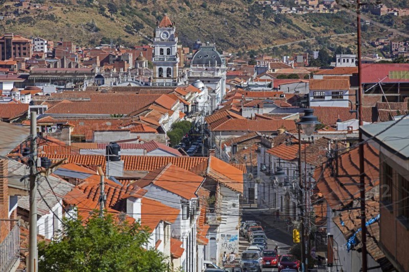 Aerial view over colonial street and rooftops in the white city of Sucre