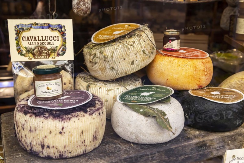 Cheese shop in the narrow streets of the old town of Pienza