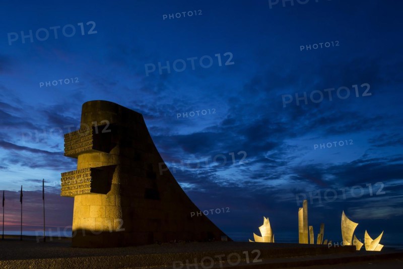 Second World War Two Omaha Beach monument and sculpture Les Braves at Saint-Laurent-sur-Mer at night