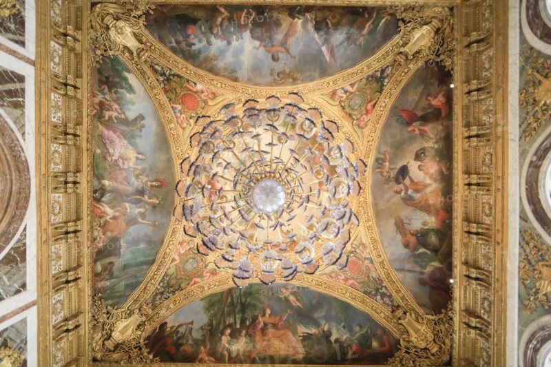 Ceiling painting and chandelier