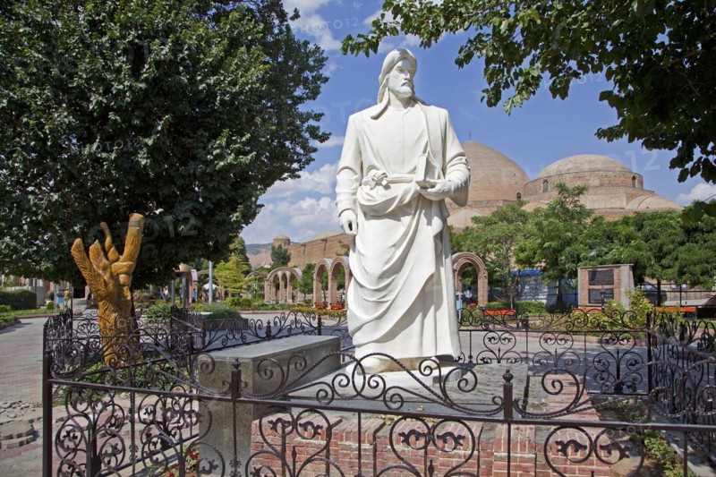 White statue of the Persian poet Khaqani in front of the Blue Mosque in the city Tabriz