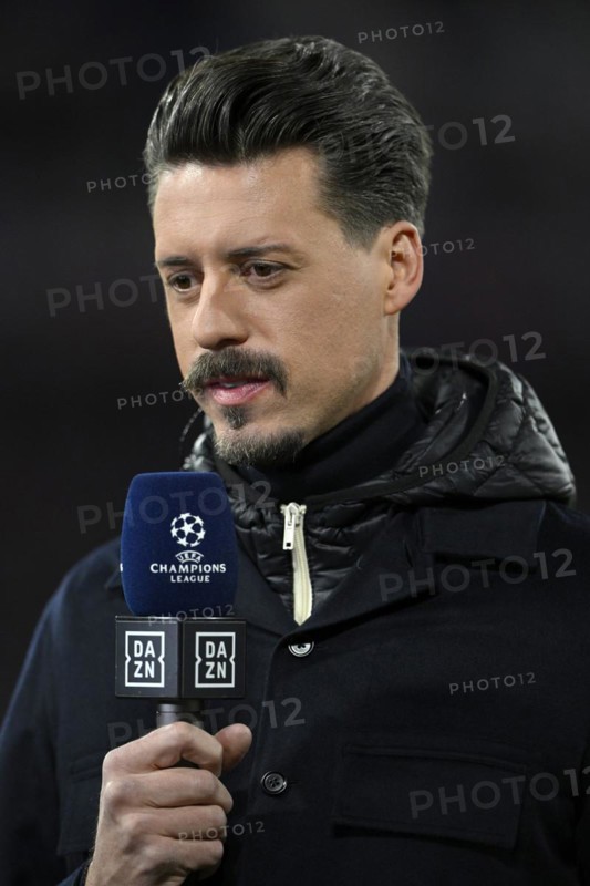 TV pundit Sandro Wagner interviewed by microphone Logo DAZN