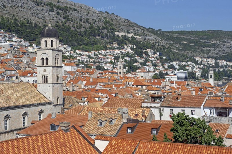Red roofs of houses and bell tower of the Franciscan friary and church in the Old Town