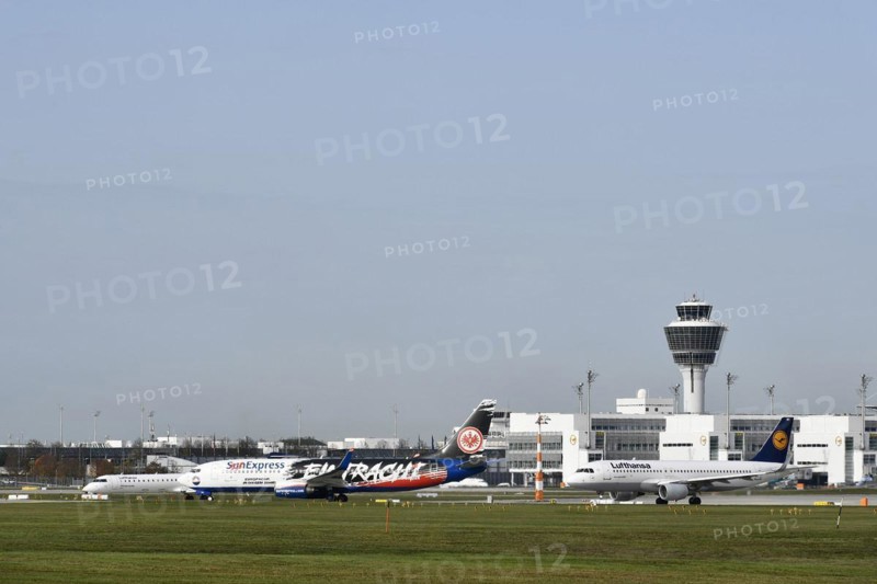 SUNEXPRESS BOEING 737-800 special livery football club Eintracht Frankfurt taking off on runway south with Lufthansa aircraft