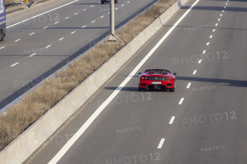 Ferrari drives in the overtaking lane when the motorway is clear