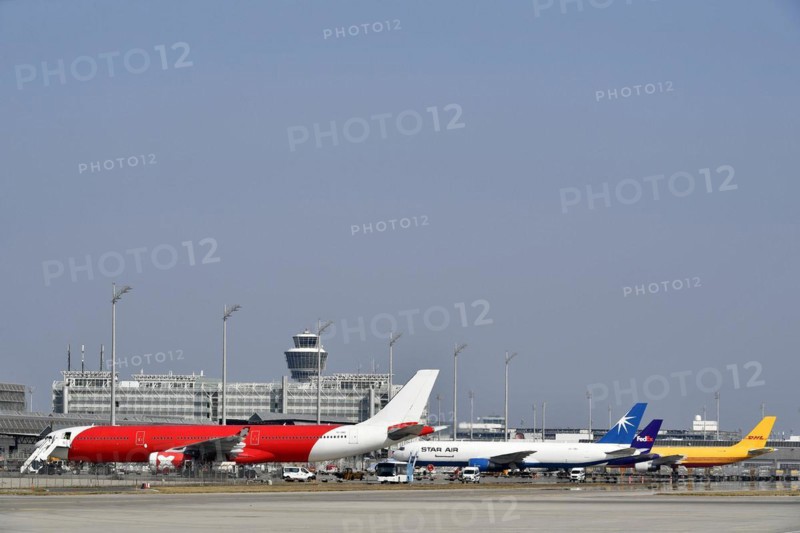 Cargo aircraft on position with tower
