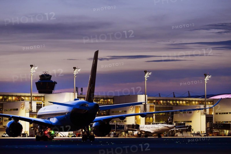 Lufthansa Airbus A350-900 New Livery being towed to position to Terminal 2 by tow truck at dusk