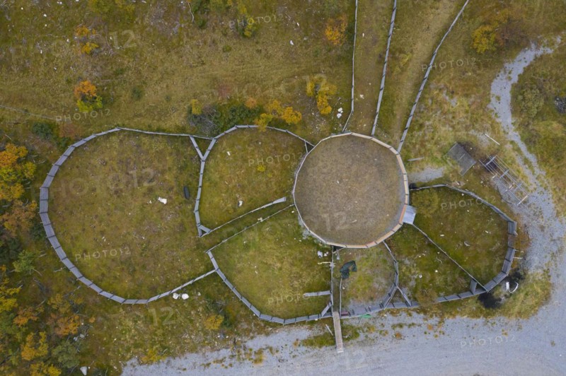 Aerial view over fences of Sami herders corral for trapping reindeer in autumn at Haerjedalen
