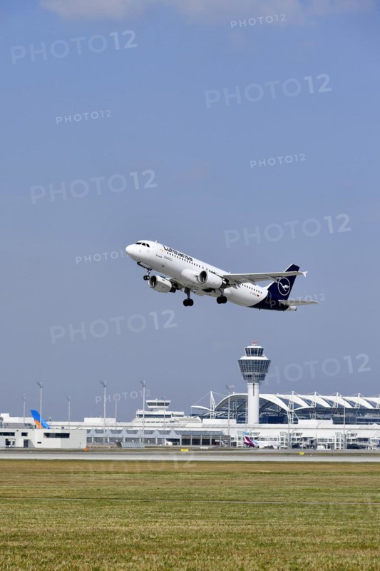 Taking off Lufthansa Airbus A320-200 on runway south with tower
