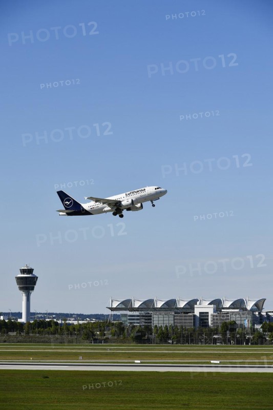 Taking off Lufthansa Airbus A319-112 on runway south with tower