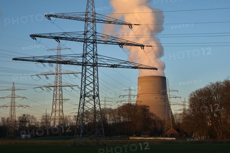 Hot steam comes out of a cooling tower
