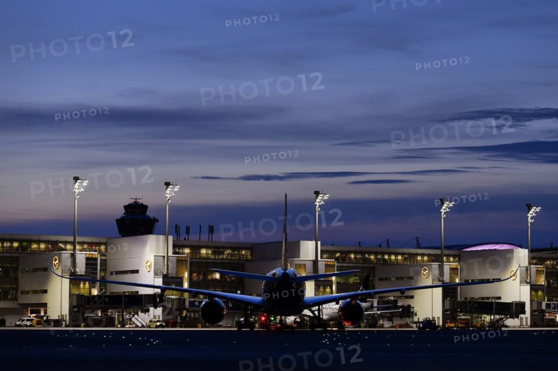 Lufthansa Airbus A350-900 New Livery being towed to position to Terminal 2 by tow truck at dusk