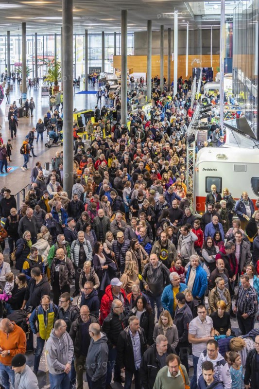 Entrance to the travel trade fair with many visitors