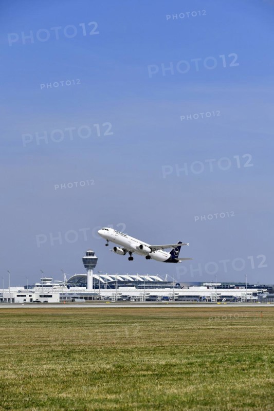 Taking off Lufthansa Airbus A320-200 on runway south with tower