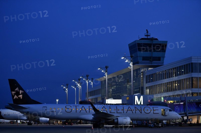Star Allianz Embraer ERJ-195 in position in front of satellite