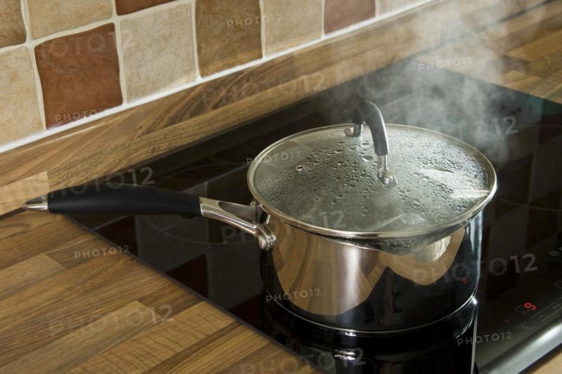 Stainless steel saucepan of boiling water
