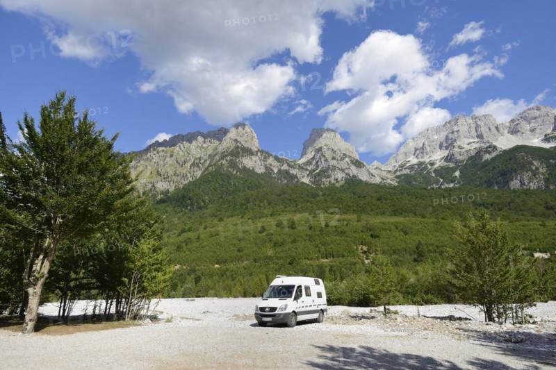 Camping bus on the dry riverbed of the Valbona