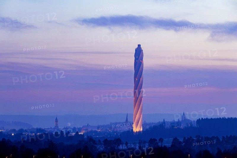 Test tower of TK-Elevator in the early morning. Express and high-speed lifts are tested in the 246-metre-high tower. Behind it, the city with its historic towers and churches. Rottweil, Baden-Wuerttemberg, Germany, Europe