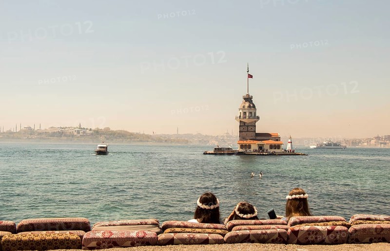 People towards Maidens Tower located in the middle of Bosporus