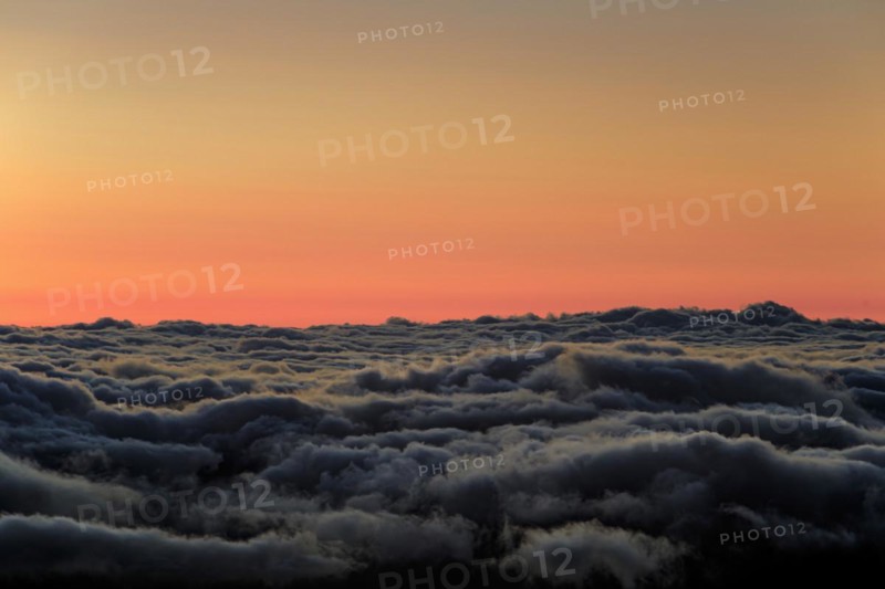 Shortly in front of sunrise above trade wind clouds at an altitude of 2000 metres, Teide National Park, Tenerife, Canary Islands, Spain, Europe