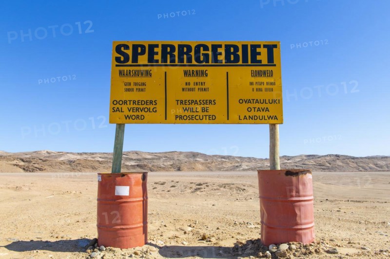 Warning sign at the diamond exclusion zone in the Sperrgebiet National Park, also Tsau ÇKhaeb National Park, Namibia, Africa