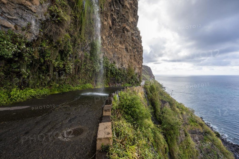 Cascata dos Anjos, waterfall over a road on the coast, Madeira, Portugal, Europe